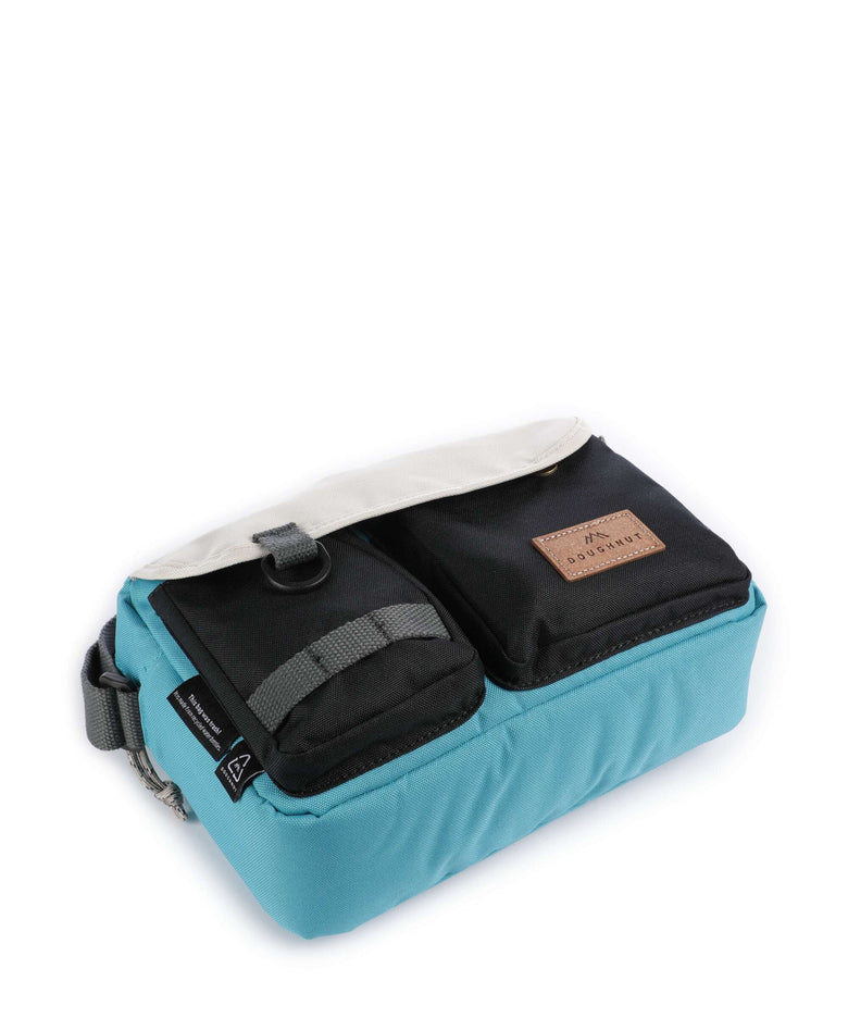 Doughnut Reborn Mission Lite Crossbody bag lagoon/stone